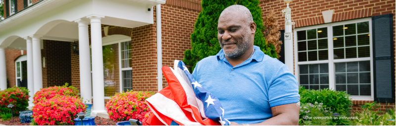 man-folding-flag